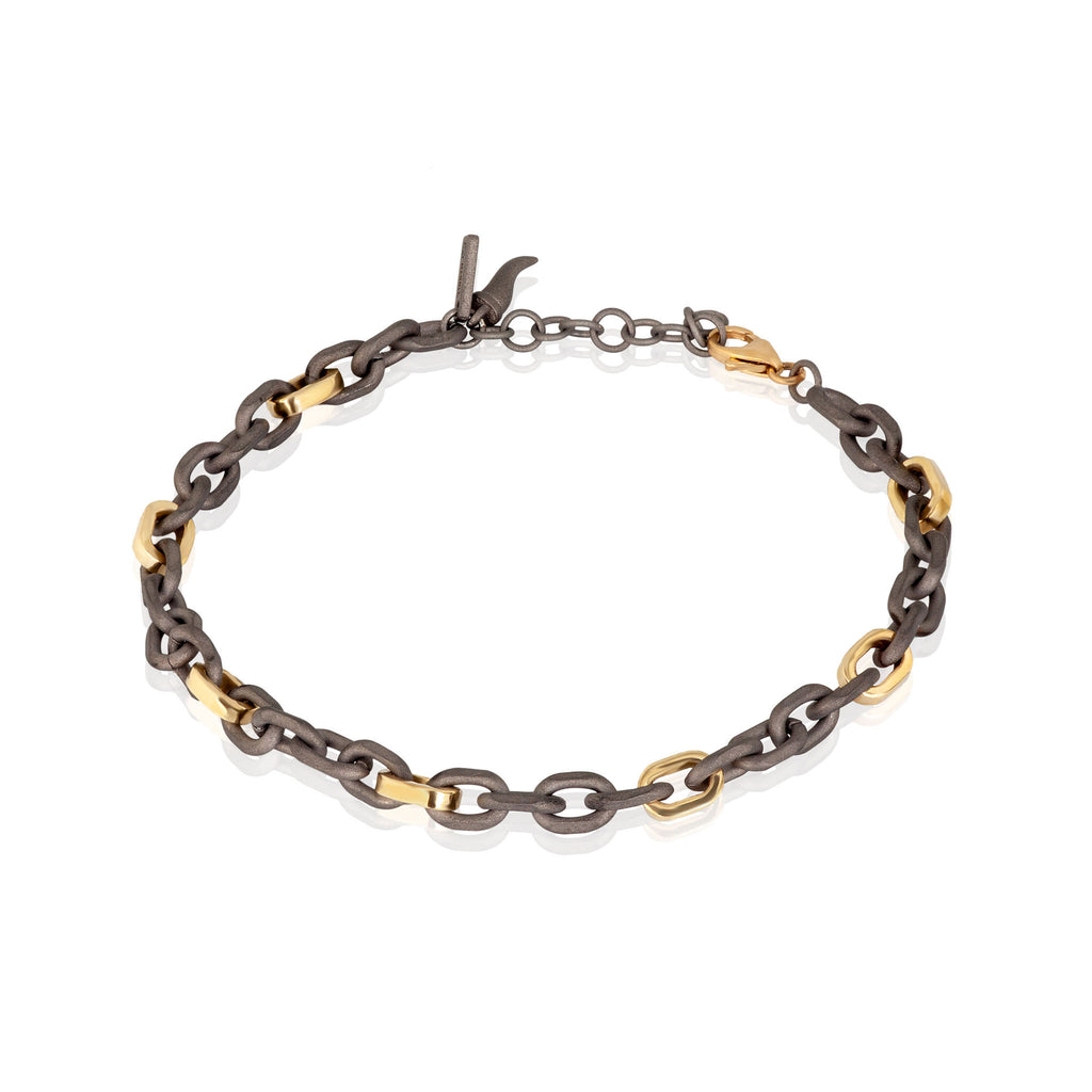 BRACCIALE UOMO CON CATENA IN TITANIO E ORO GIALLO 9 KT