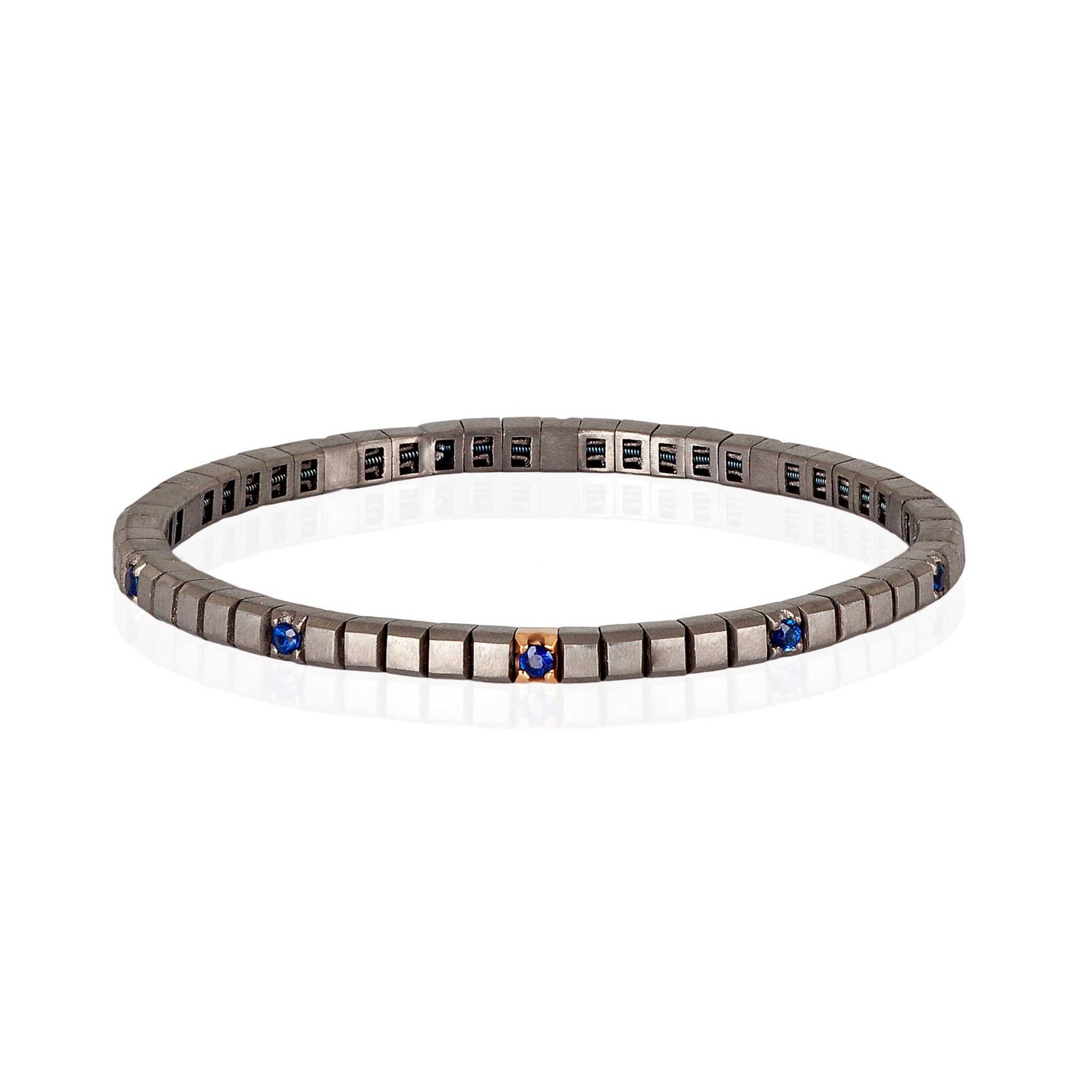 BRACCIALE TENNIS LINEA ELASTICA IN TITANIO, ORO ROSSO 18 KT E 10 ZAFFIRI BLU DA 5 PUNTI.