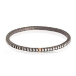 BRACCIALE TENNIS LINEA ELASTICA IN TITANIO, ORO ROSSO 18 KT E DIAMANTI WHITE  DA 3 PUNTI.