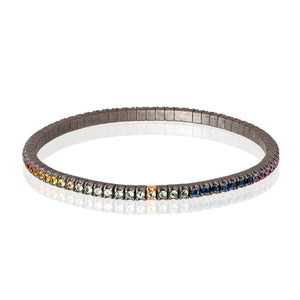 BRACCIALE TENNIS LINEA ELASTICA IN TITANIO, ORO ROSSO 18 KT E ZAFFIRI MULTICOLOR DA 3 PUNTI.