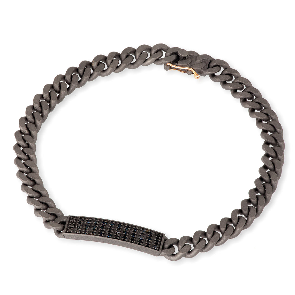 BRACCIALE UOMO LINEA GROUMETTE IN TITANIO, TARGHETTA CON DIAMANTI BLACK E ORO ROSSO 18KT.