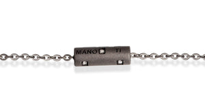 BRACCIALE CON CILINDRO CORTO IN TITANIO SABBIATO, 6 DIAMANTI WHITE, CATENA CON CONTROMAGLIA IN ORO ROSSO 18KT