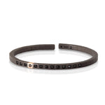 BRACCIALE UOMO LINEA LOOP IN TITANIO, ORO ROSSO 9 KT, DIAMANTI BLACK.