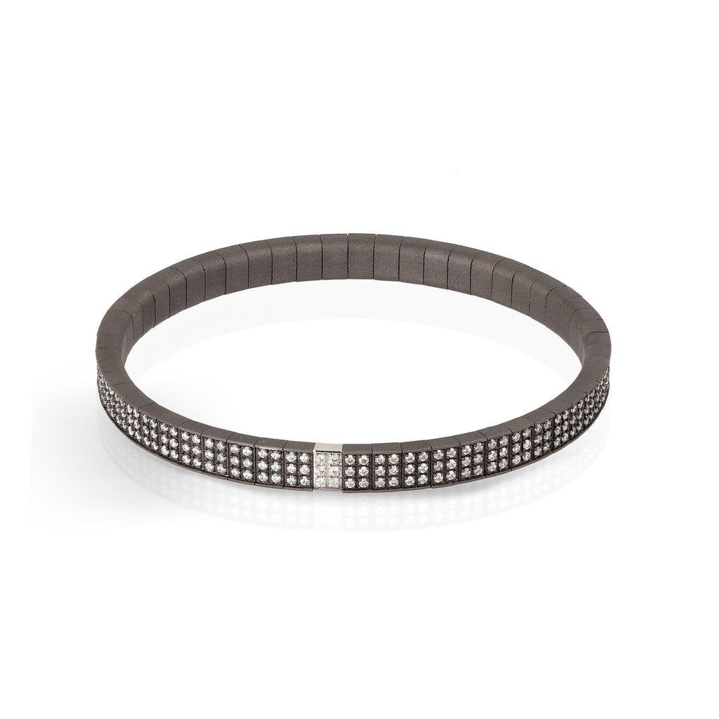 BRACCIALE LINEA LOOP IN TITANIO, DIAMANTI WHITE E ORO BIANCO 18 KT.