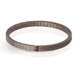 BRACCIALE LINEA LOOP IN TITANIO, DIAMANTI BLACK E ORO ROSSO 18 KT.