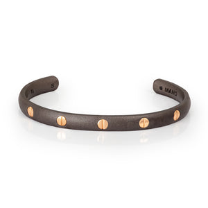 BRACCIALE RIGIDO GRANDE UOMO LINEA BOOST IN TITANIO E 5 VITI IN ORO ROSSO 9 KT.