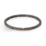 BRACCIALE TENNIS LINEA LOOP IN TITANIO, ORO ROSSO 18 KT E 11 DIAMANTI BLACK DA 5 PUNTI.