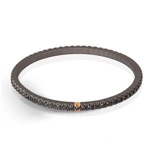 BRACCIALE TENNIS LINEA LOOP IN TITANIO, ORO ROSSO 18 KT E DIAMANTI BLACK DA 2 PUNTI.