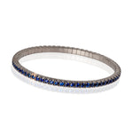 BRACCIALE TENNIS LINEA LOOP IN TITANIO, ORO ROSSO 18 KT E ZAFFIRI BLU DA 5 PUNTI.