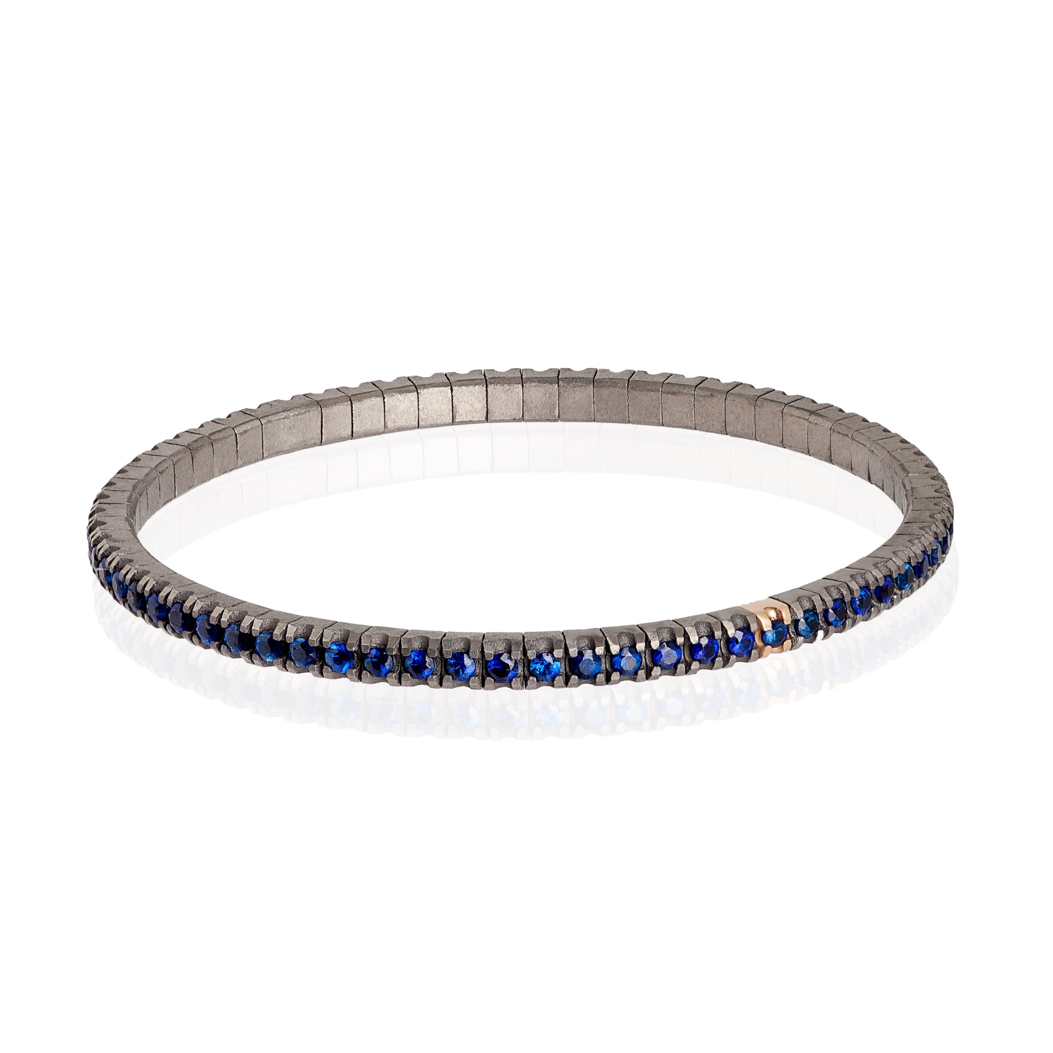 BRACCIALE TENNIS LINEA LOOP IN TITANIO, ORO ROSSO 18 KT E ZAFFIRI BLU DA 5 PUNTI.